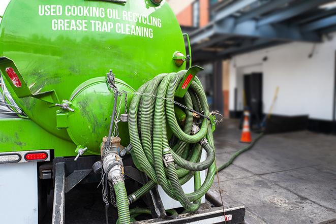pumping out grease trap at commercial kitchen in Foster City, CA